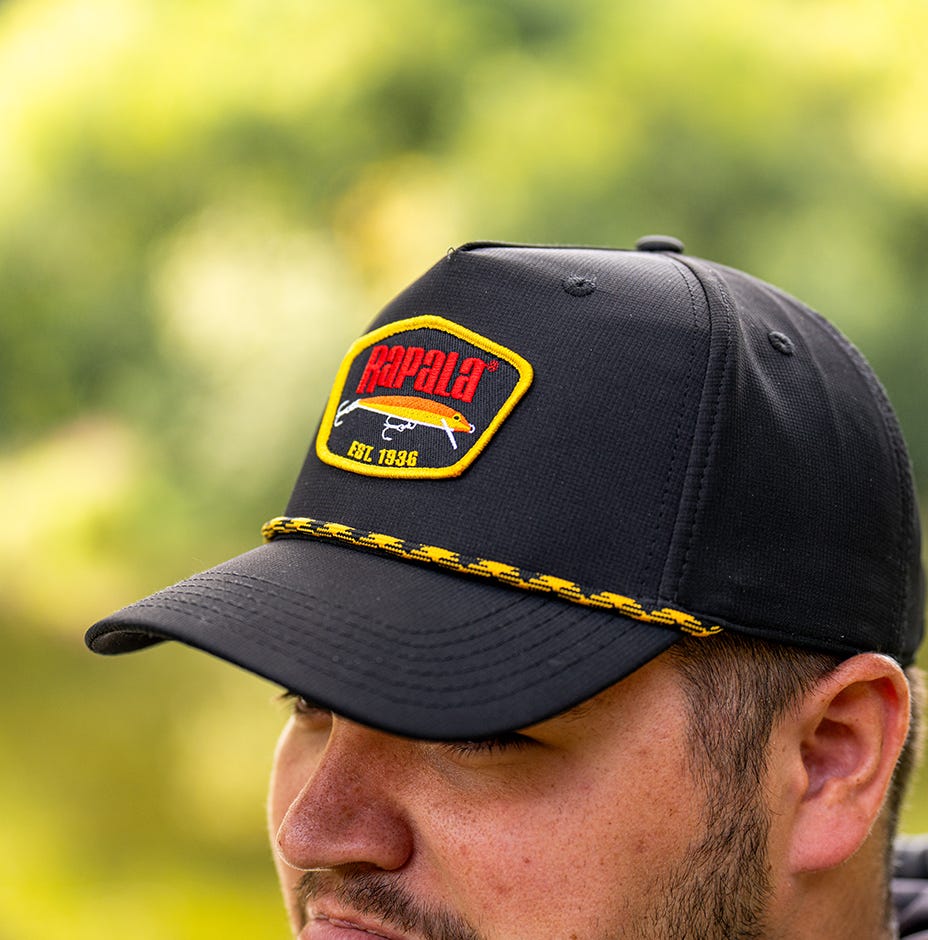 closeup of yellow rapala late 80s rope hat